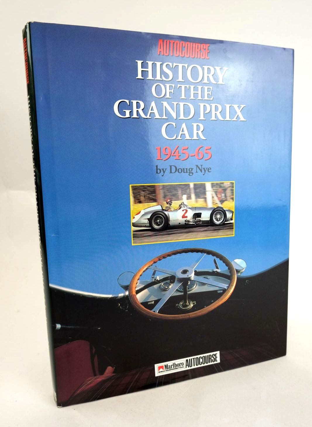 Cover of THE AUTOCOURSE HISTORY OF THE GRAND PRIX CAR 1945-65 by Doug Nye