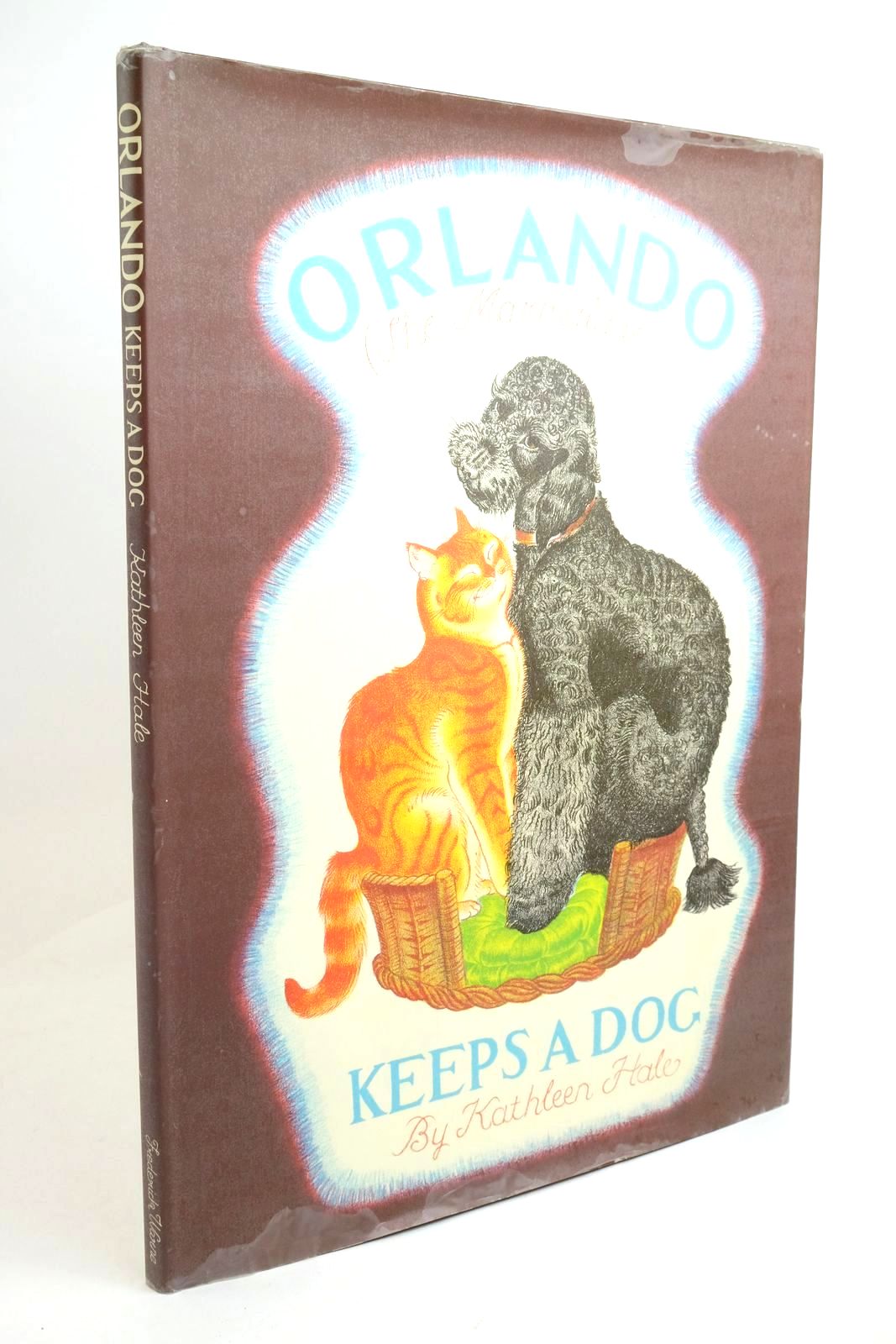 Photo of ORLANDO (THE MARMALADE CAT) KEEPS A DOG- Stock Number: 1322174