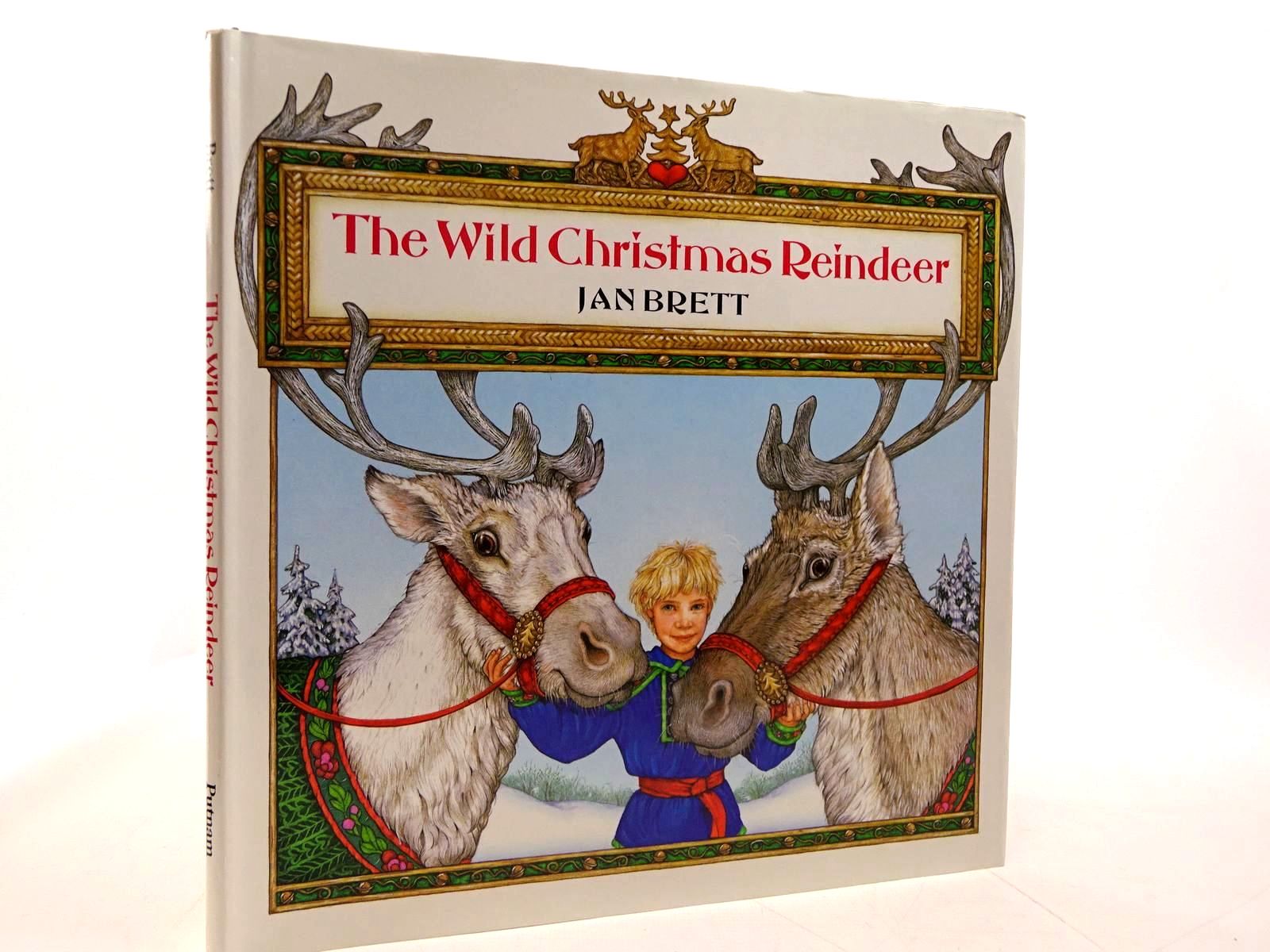Photo of THE WILD CHRISTMAS REINDEER written by Brett, Jan illustrated by Brett, Jan published by G.P. Putnam's Sons (STOCK CODE: 2130801)  for sale by Stella & Rose's Books