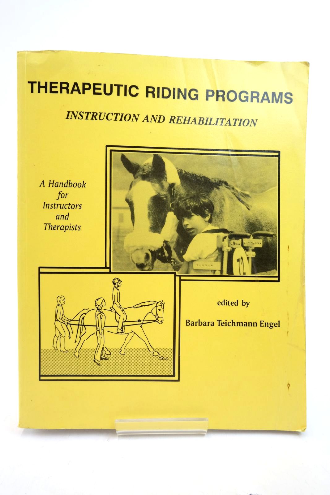 Photo of THERAPEUTIC RIDING PROGRAMS: INSTRUCTION AND REHABILITATION written by Engel, Barbara Teichmann et al, illustrated by Woods, Stephanie C. published by Barbara Engel Therapy Services (STOCK CODE: 2139523)  for sale by Stella & Rose's Books